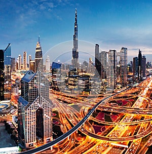 Skyline of Dubai bussines downtown at sunrise, United Arab Emirates photo