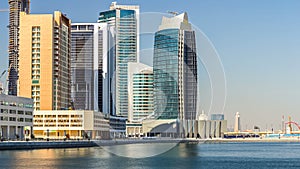 Skyline of Dubai's business bay with skyscrapers at day time timelapse