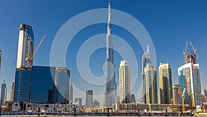 Skyline of Dubai's business bay with skyscrapers at day time timelapse