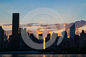 Skyline of the east side of midtown Manhattan at sunset