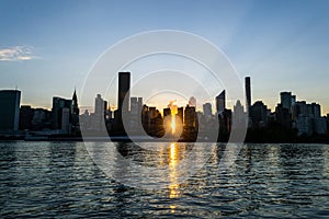 Skyline of the east side of midtown Manhattan at sunset