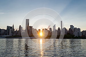 Skyline of the east side of midtown Manhattan at sunset