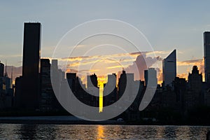 Skyline of the east side of midtown Manhattan at sunset