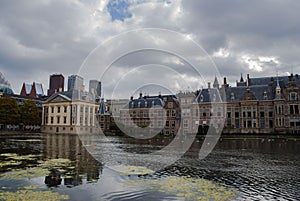 Skyline of The Hague with the modern office buildings behind the Mauritshuis museum and the Binnenhof parliament building next to