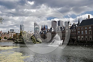 Skyline of The Hague with the modern office buildings behind the Mauritshuis museum and the Binnenhof parliament building next to