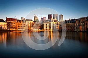 Skyline of The Hague with the modern office buildings. Reflection of Hofvijver lake in Den Haag, Netherlands.