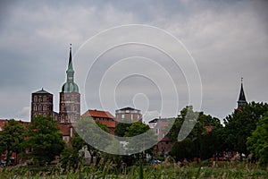 The skyline of the Hanseatic city of Stralsund with the steeples of the St. Nikolai Church