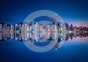 Skyline Hong Kong city at twilight time view from harbor in Hong Kong