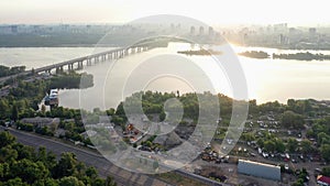 Skyline of Kiev city with Dnipro river and Paton bridge.