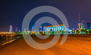 Skyline of Kuwait with the National assenbly building and the Liberation tower during night....IMAGE