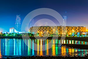 Skyline of Kuwait during night including the Seif palace and the National assembly building....IMAGE
