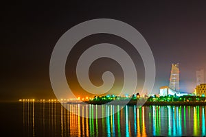 Skyline of Kuwait during night including the Seif palace and the National assembly building photo