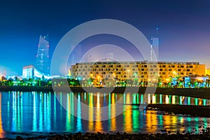 Skyline of Kuwait during night including the Seif palace and the National assembly building....IMAGE photo