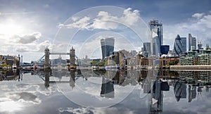 The skyline of London with reflections in the water, United Kingdom