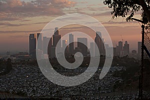 Skyline of Los Angeles at cloudy sunset. California, USA.