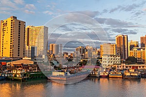 Skyline of Manila behind Pasig river, Philippine