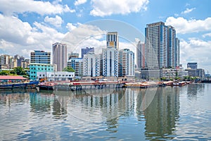 Skyline of manila by Pasig River in philippines