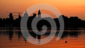 Skyline of Mantova from Lake at sunset, Lombardy, Italy