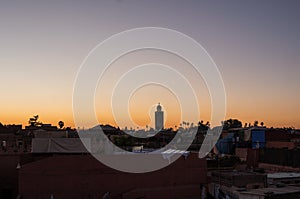 Skyline of Marrakesh City, Morocco at evening sunset time viewed from above city