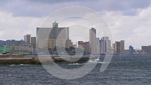 Skyline of modern Havana and Caribbean sea, Cuba