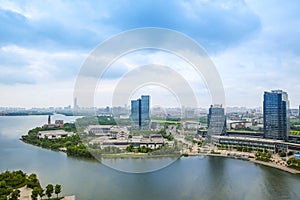 The skyline of modern urban architecture and the scenery of Taihu Lake in Suzhou, Jiangsu Province, China