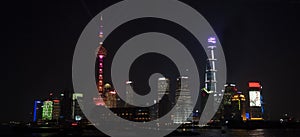 Skyline panorama at night of Pudong - the financial center of Shanghai at the Huangpu River. Home to the Lujiazui Finance and Trad