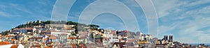 Skyline panorama of the oldest part of Lisbon with Sao Jorge Castle and Lisbon Cathedral and Alfama, Mouraria and Castelo photo