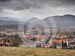 Skyline of the picturesquely situated town of Boguszow-Gorce in Poland with the Dzikowiec Mountain in the background photo