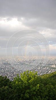 Skyline, rainbow, lover locks and satelite from top of mountain Moiwa, Hokkaido, Japan