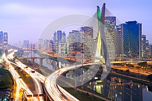 Skyline of Sao Paulo at night with Octavio Frias de Oliveira Bridge photo