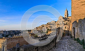 Skyline of the Sassi of Matera from typical hallway, Italy: view of the the Cathedral.