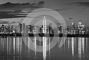 Skyline of Shenzhen city, China at dusk. Viewed from Hong Kong border Lau Fau Shan