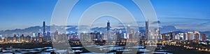 Skyline of Shenzhen City, China at twilight. Viewed from Hong Ko