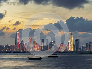 Skyline of Shenzhen city, China under sunset. Viewed from Hong Kong border Lau Fau Shan