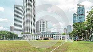 Skyline with Singapore Recreation Club and skyscrapers on background timelapse hyperlapse