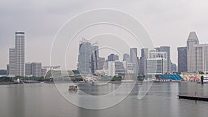 Skyline with skyscrapers of Marina Bay timelapse hyperlapse.