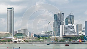 Skyline with skyscrapers of Marina Bay timelapse hyperlapse.