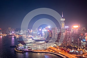 Skyline of skyscrapers in Wan Chai at dusk, with the Hong Kong Convention & Exhibition Centre, 11 Dec 2019