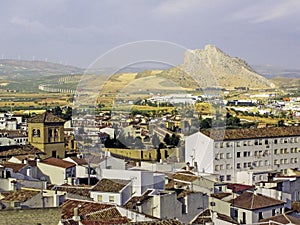 Skyline of the town of Antequera with the lovers rocks Pena de los Enamorados in the background, Antequera, Malaga, Andalusia, photo