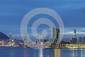 Skyline of Victoria Harbor of Hong Kong city at dusk