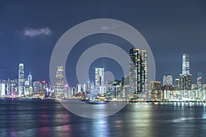 Skyline of Victoria Harbor of Hong Kong city at night