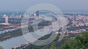 Skyline of Vienna from Danube Viewpoint Leopoldsberg aerial day to night time lapse.