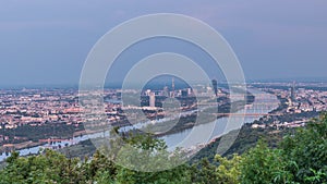 Skyline of Vienna from Danube Viewpoint Leopoldsberg aerial day to night timelapse.