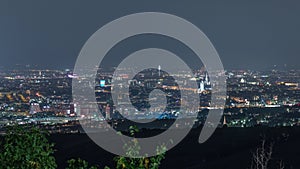 Skyline of Vienna from Danube Viewpoint Leopoldsberg aerial night time lapse.