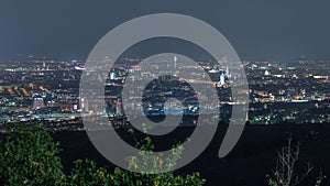 Skyline of Vienna from Danube Viewpoint Leopoldsberg aerial night timelapse.