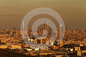 A skyline view of Abu Dhabi, UAE at dawn, with the Corniche and World Trade Centre