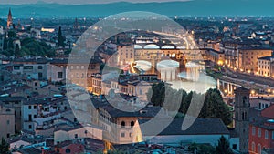 Skyline view of Arno River day to night timelapse, Ponte Vecchio from Piazzale Michelangelo at Sunset, Florence, Italy.