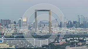 Skyline view of Deira and Sharjah districts in Dubai day to night timelapse after sunset, UAE.