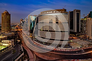 A skyline view of Doha City Center at dusk