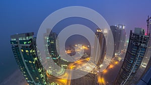 The skyline of the West Bay area from top in Doha day to night timelapse, Qatar.